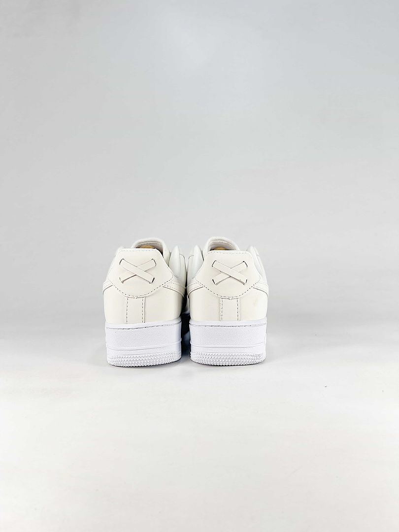 Kith x Nike Air Force 1 Low Triple White Woven Sneakers